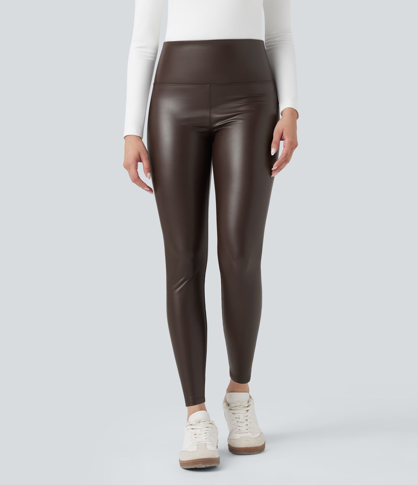 Lässige 2-in-1 Skinny-Leggings aus elastischem Kunstleder mit hohem Bund, Seitentaschen und Bauchkontrolle