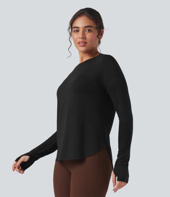 Sudadera casual holgada de manga larga con aberturas en la espalda y dobladillo curvo