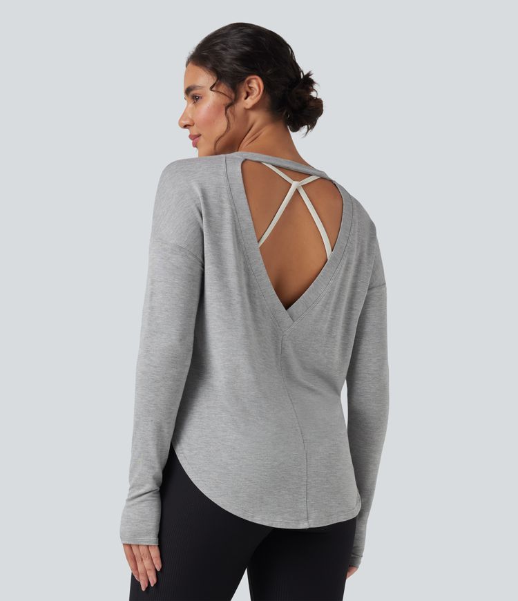 Sudadera casual holgada de manga larga con aberturas en la espalda y dobladillo curvo