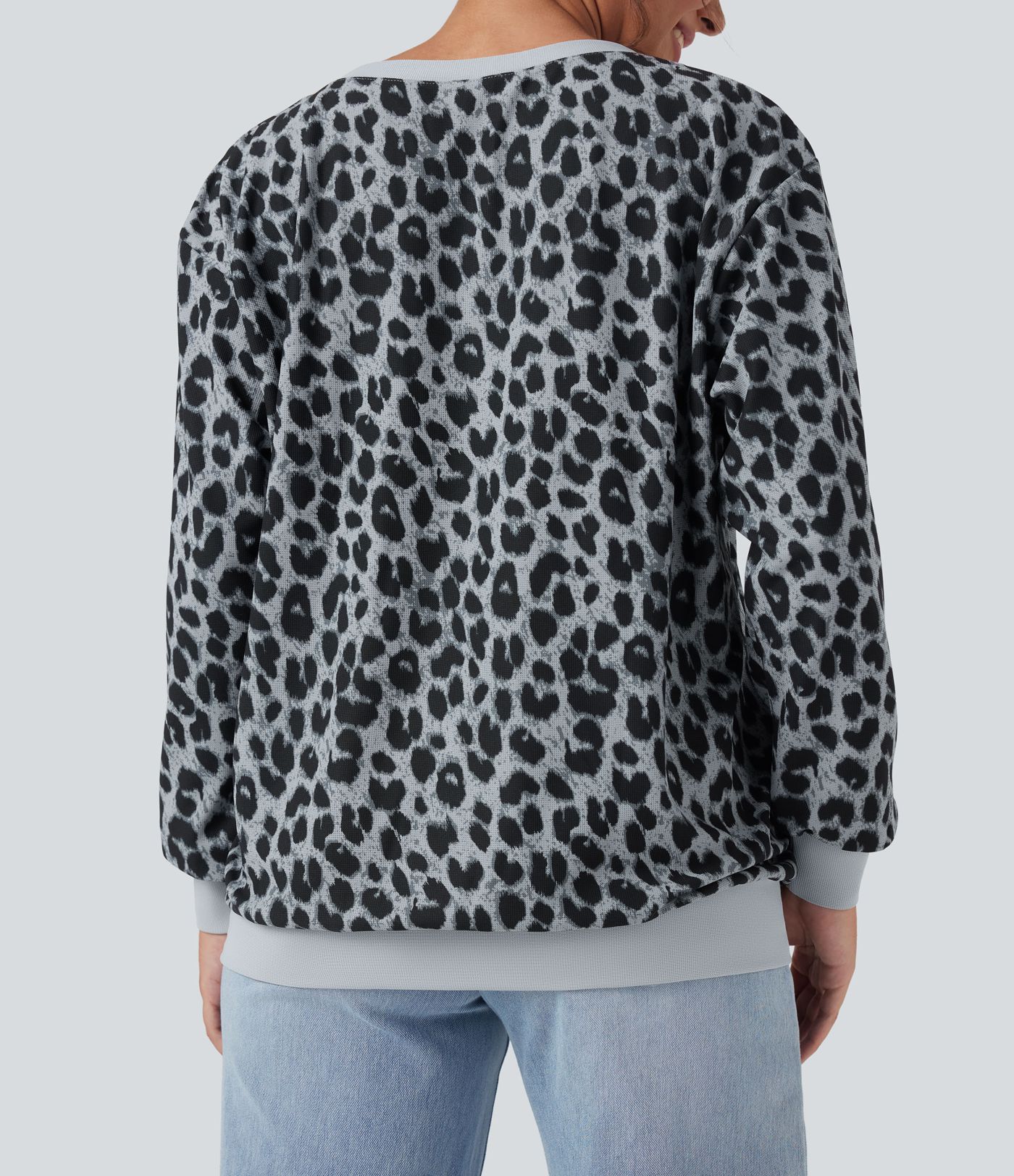 Sudadera casual extragrande de manga larga con cuello redondo y estampado de leopardo con bolsillos