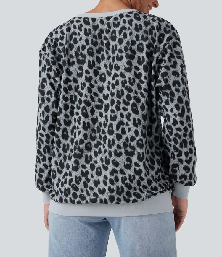 Sudadera casual extragrande de manga larga con cuello redondo y estampado de leopardo con bolsillos