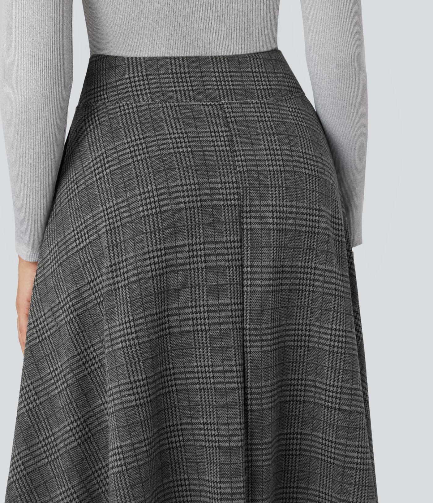 Högmidjad maxikjol i hundtandsmönster med fickor