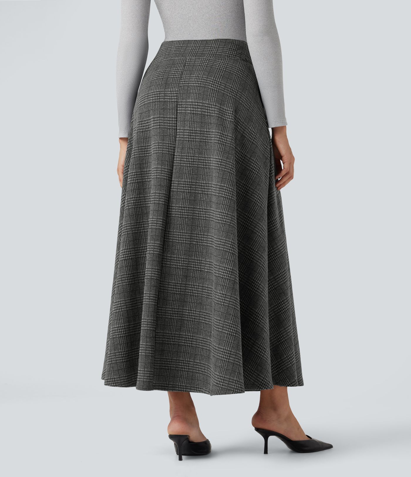 Högmidjad maxikjol i hundtandsmönster med fickor