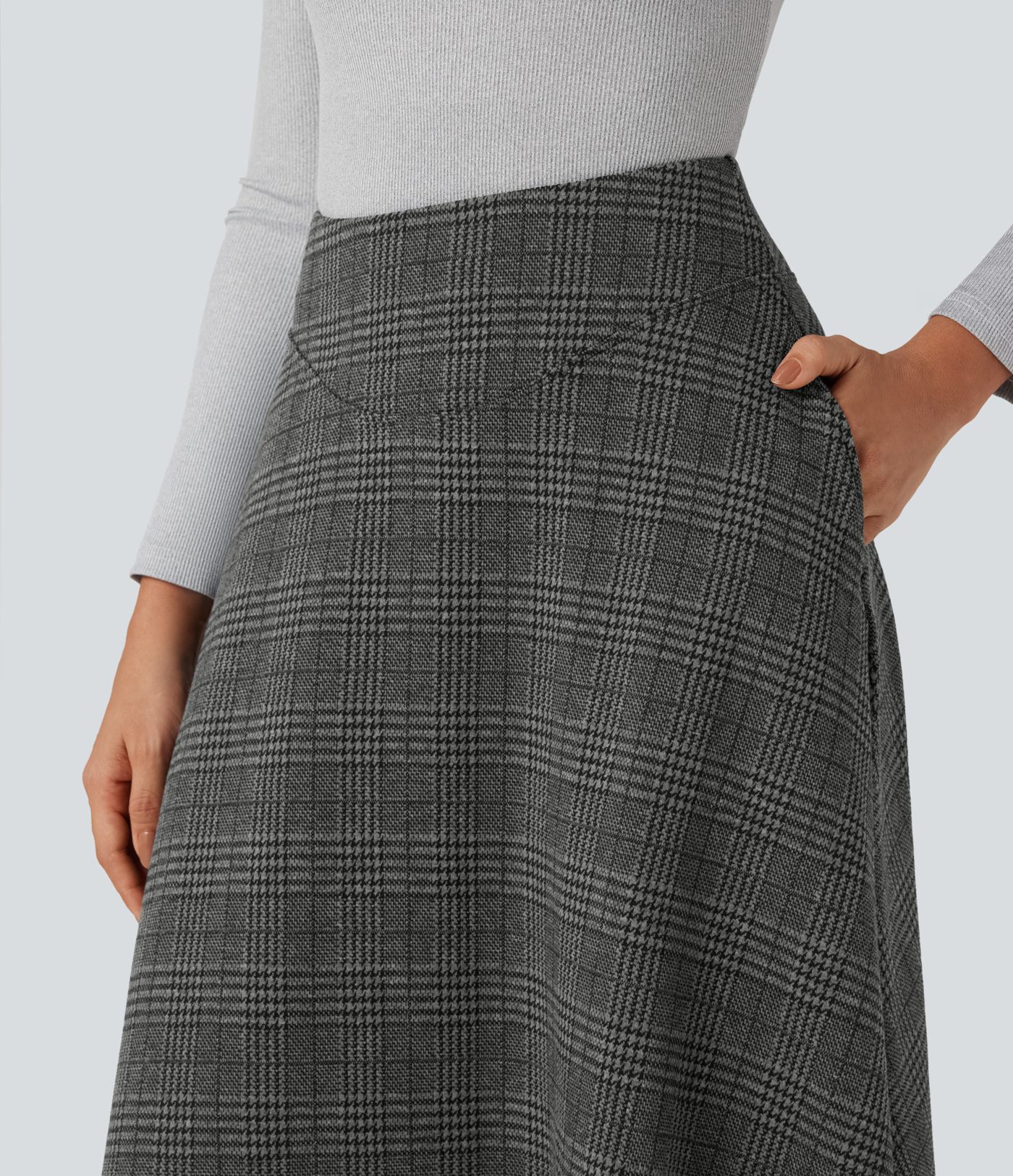 Högmidjad maxikjol i hundtandsmönster med fickor