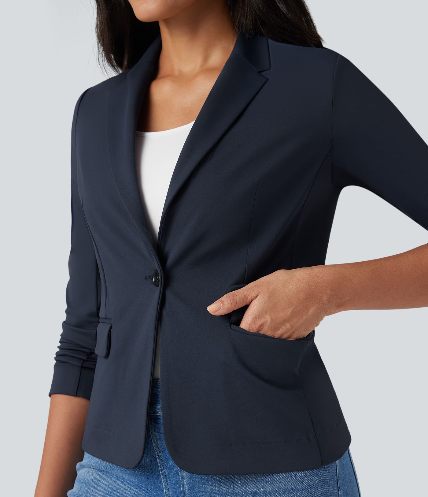Blazer de trabalho com lapela com entalhe, mangas compridas e bolsos
