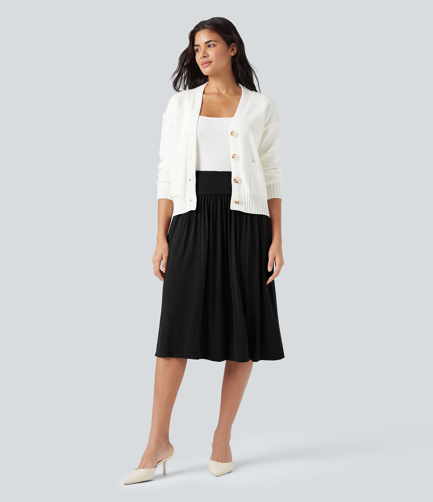 Lässiger, fließender Midirock mit hohem Bund, Seitentaschen und Bauchkontrolle