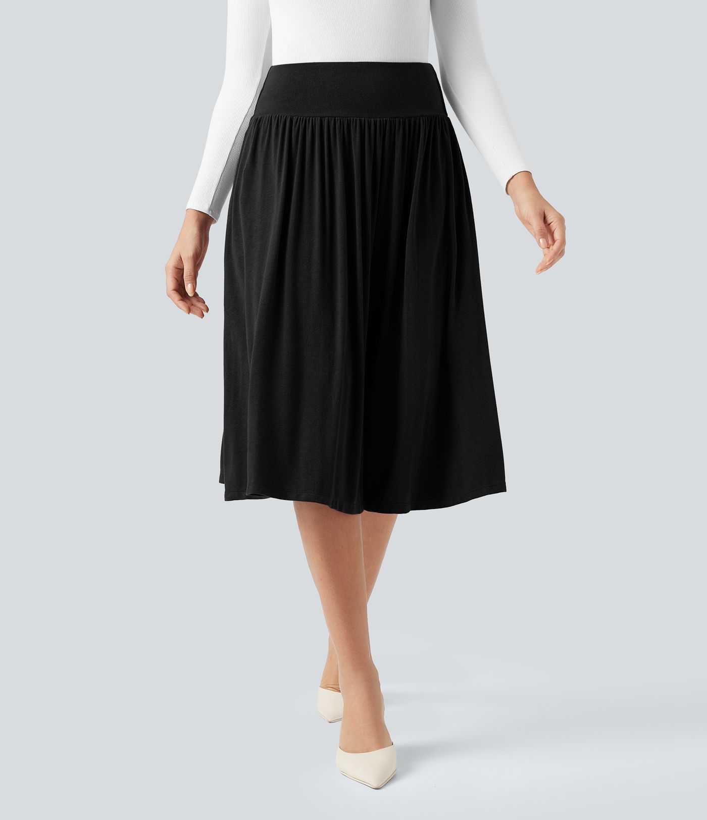 Lässiger, fließender Midirock mit hohem Bund, Seitentaschen und Bauchkontrolle
