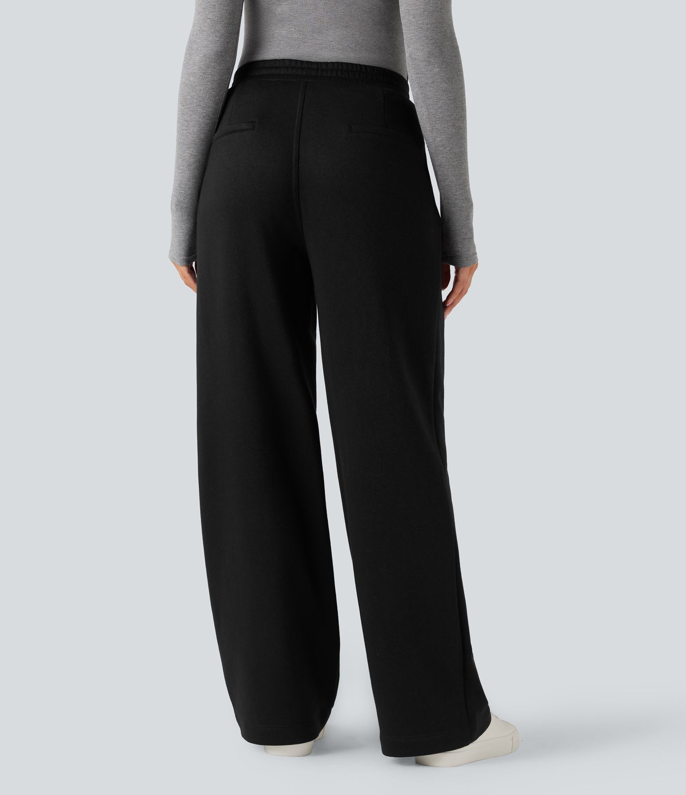 Fleece work trousers with high waist, straight legs, and pockets