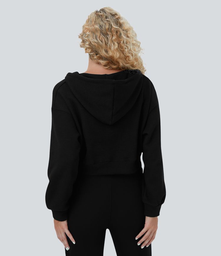 Sudadera deportiva algodón recortada cremallera cordón capucha gofre