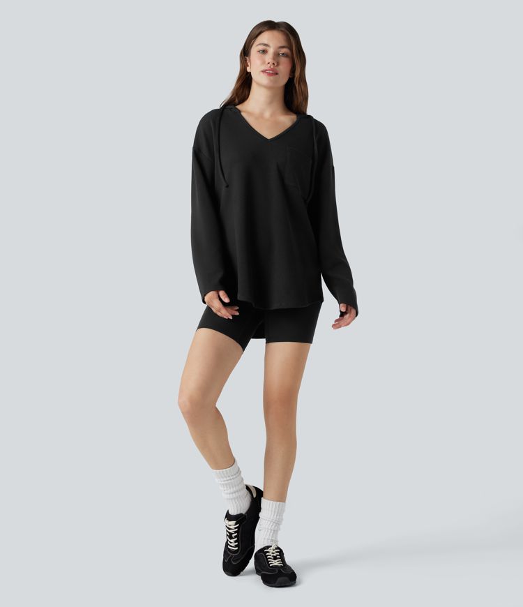 Sweat-shirt à capuche gaufré cordon de serrage manches longues ourlet arrondi avec poche