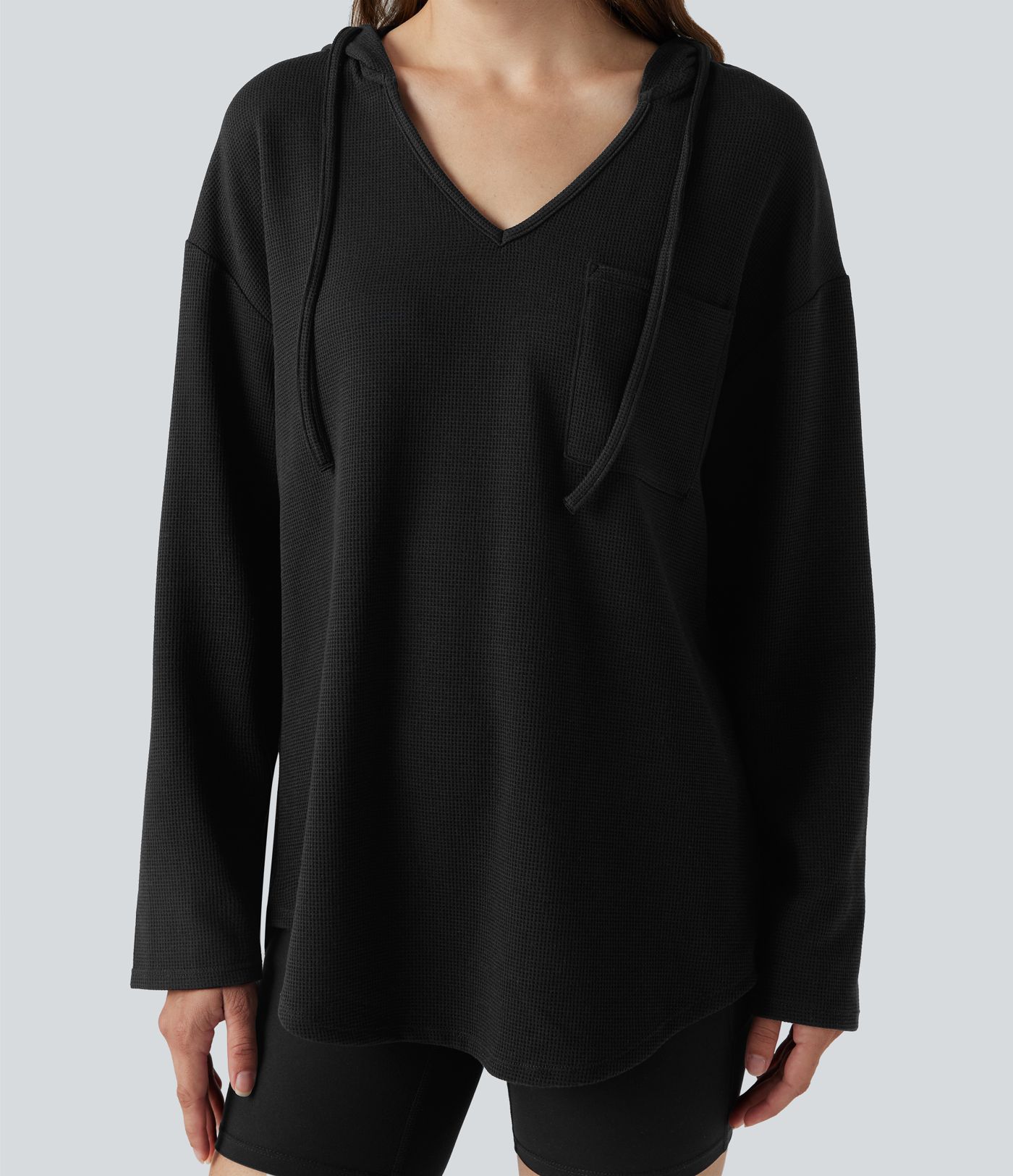 Sweat-shirt à capuche gaufré cordon de serrage manches longues ourlet arrondi avec poche