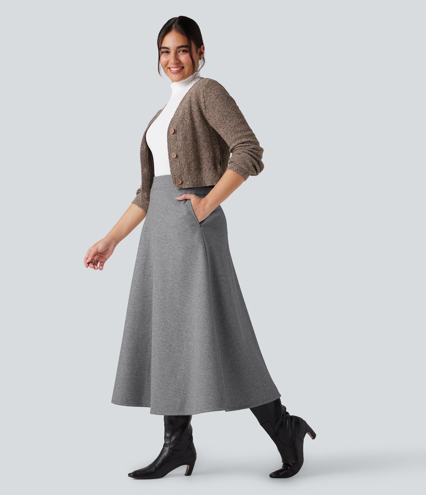 Jupe mi-longue évasée polaire taille haute avec poches