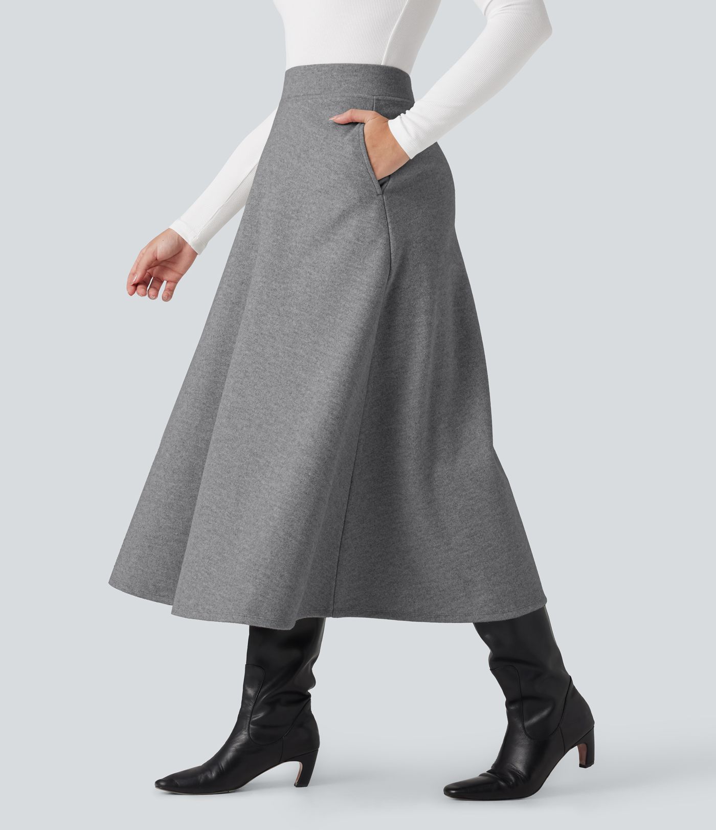 Jupe mi-longue évasée polaire taille haute avec poches