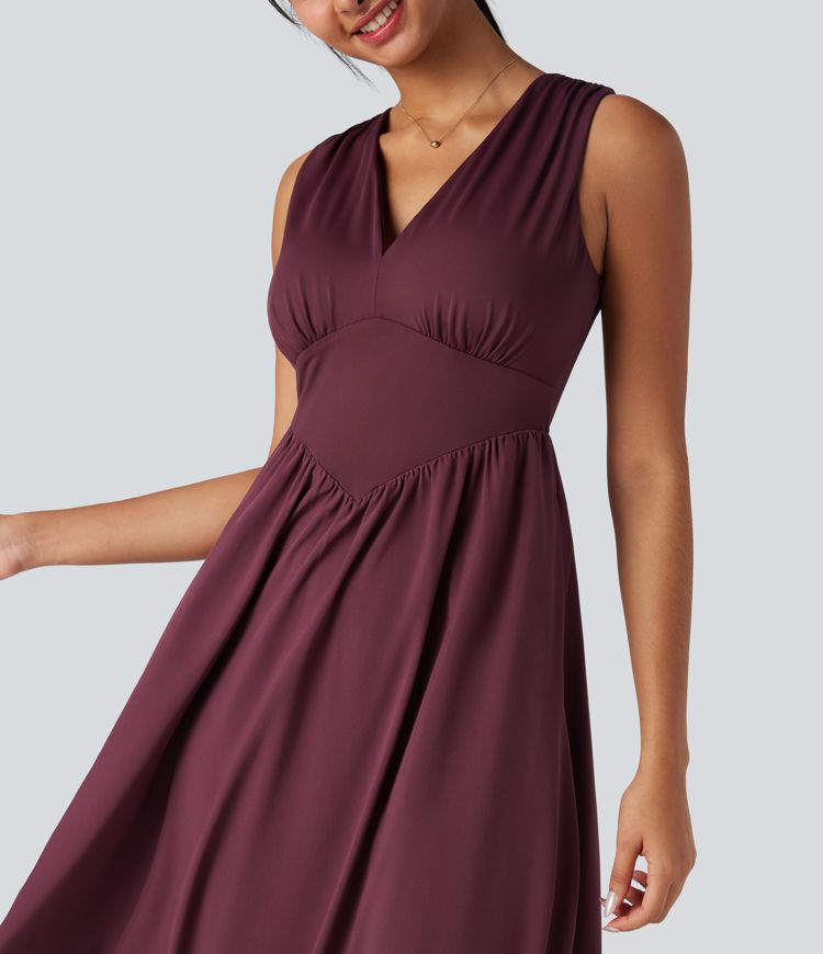 Robe mi-longue fluide décontractée gainante sans manches à décolleté en V profond et séchage rapide avec poches Breezeful™