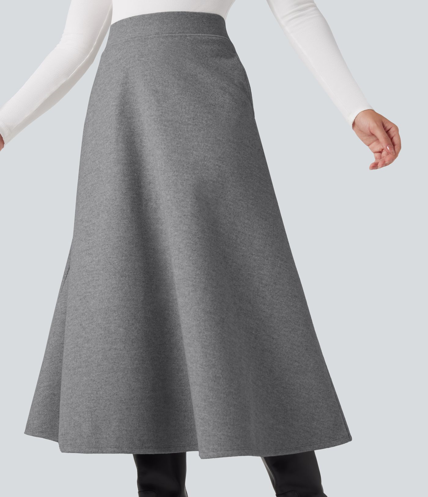 Jupe mi-longue évasée polaire taille haute avec poches