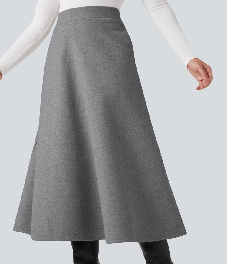 Jupe mi-longue évasée polaire taille haute avec poches
