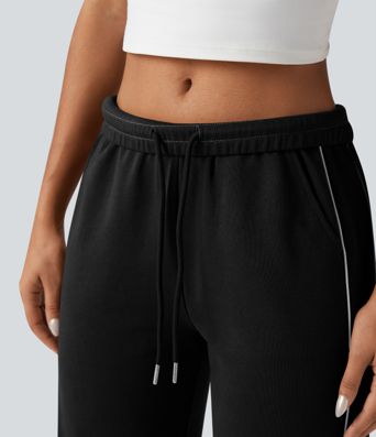 Pantaloni casual in cotone a blocchi di colore, vita media con coulisse, gamba dritta e tasche.