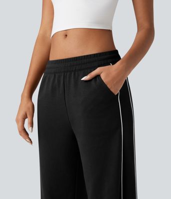 Pantaloni casual in cotone a blocchi di colore, vita media con coulisse, gamba dritta e tasche.