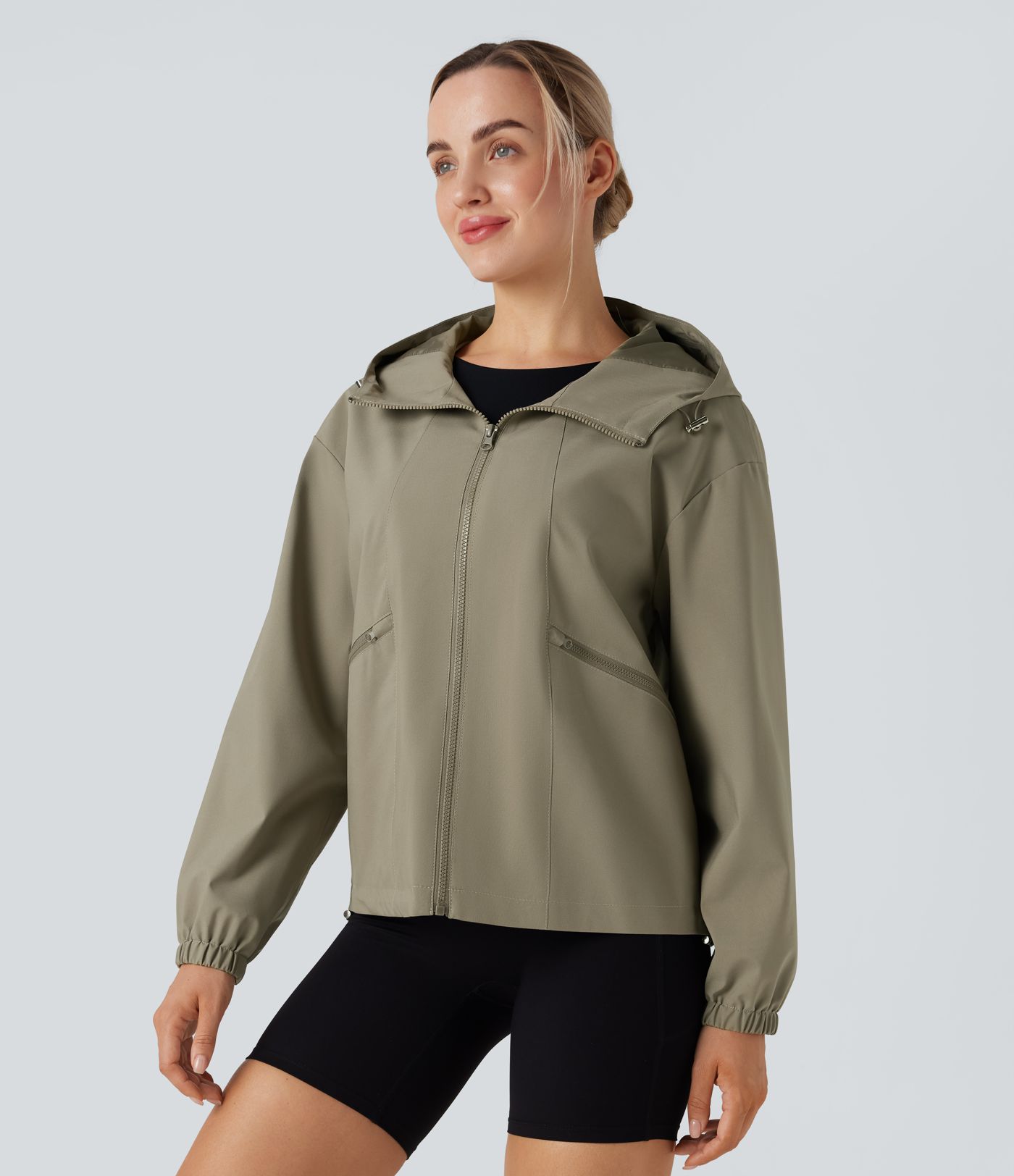 Veste randonnée à capuche déperlante avec cordon de serrage ajustable et poches