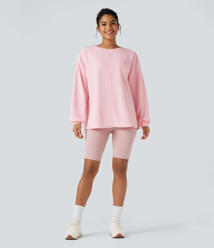 Sudadera casual oversized de tejido waffle, cuello redondo, manga larga, dobladillo con abertura y bolsillos