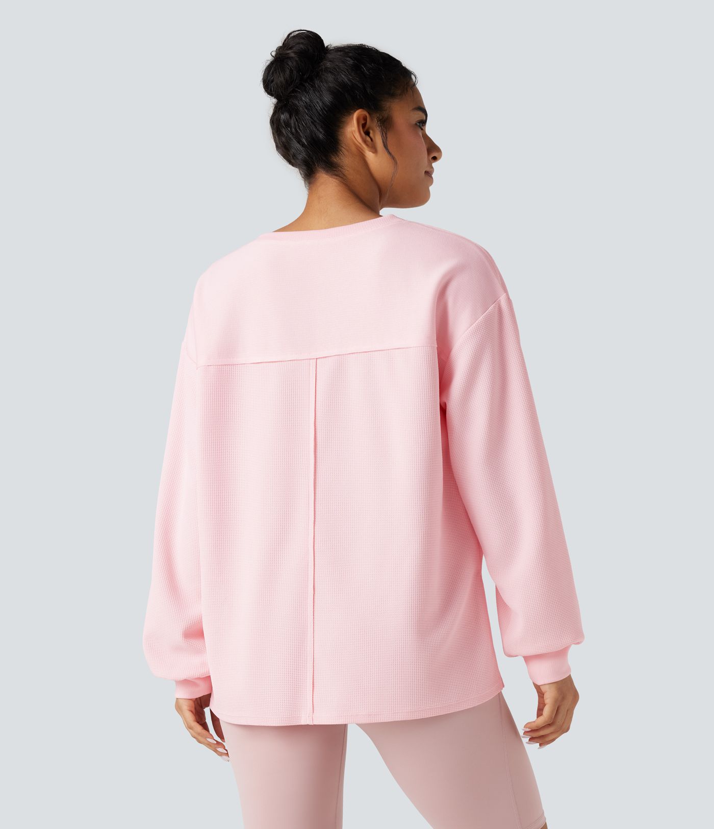 Sudadera casual oversized de tejido waffle, cuello redondo, manga larga, dobladillo con abertura y bolsillos