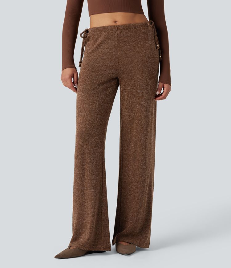 Priložnostne hlače iz rebraste pletenine z metalnim učinkom, s srednjim pasom, z zavezovalno vrvico, širokimi hlačnicami in žepi