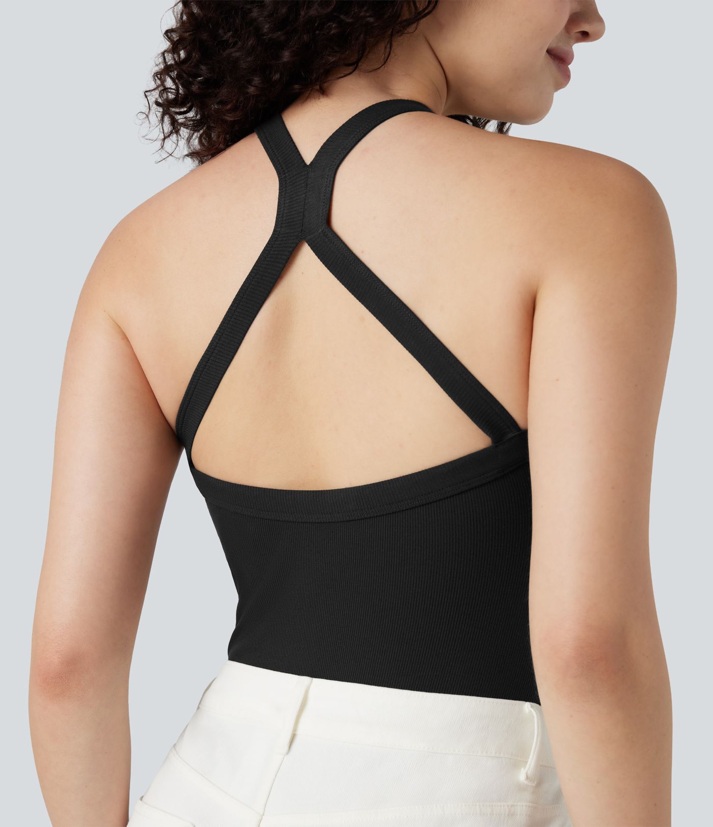 Gerippter, ärmelloser, figurbetonter Body mit V-Ausschnitt und überkreuztem Rückendetail, lässig