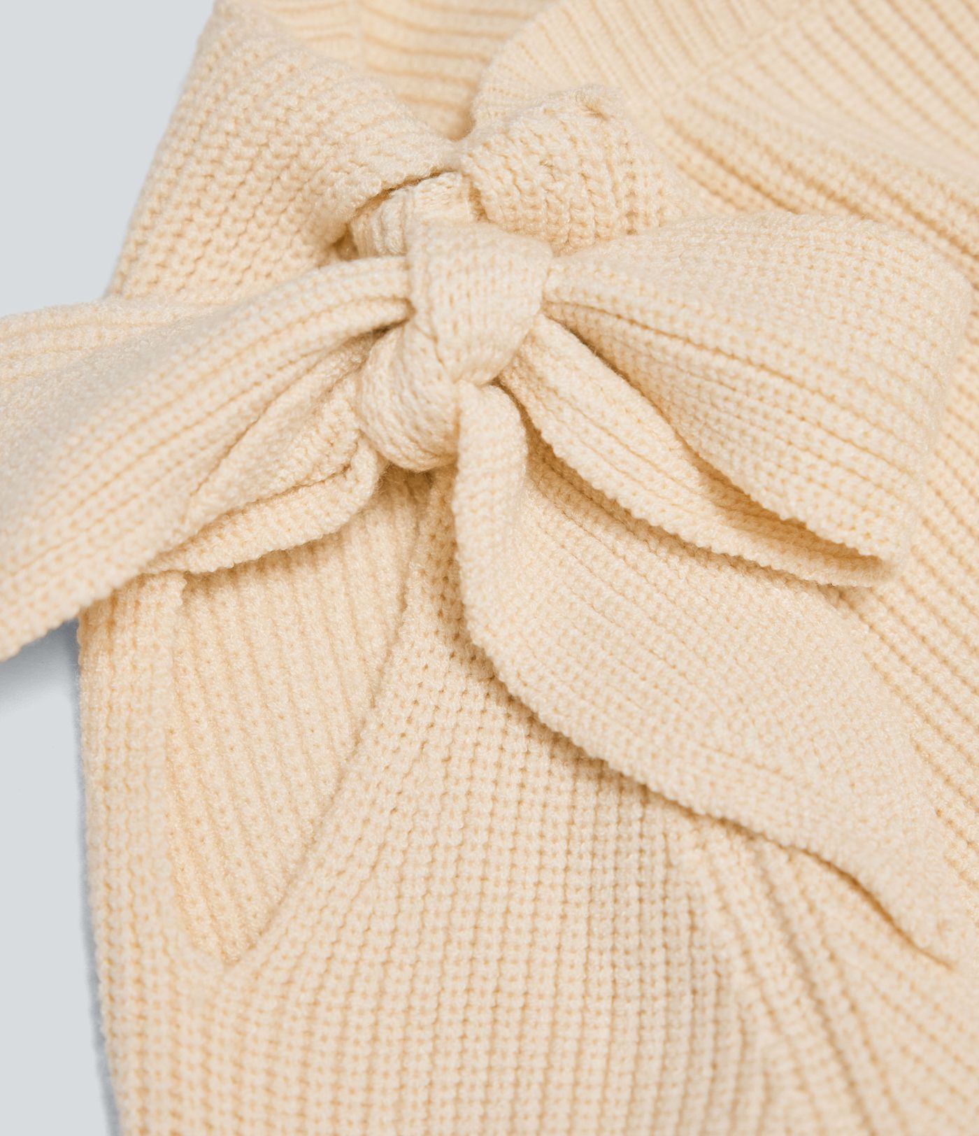 Lässiges Stricktop mit Rundausschnitt, Seitenbindung und langen Ärmeln​