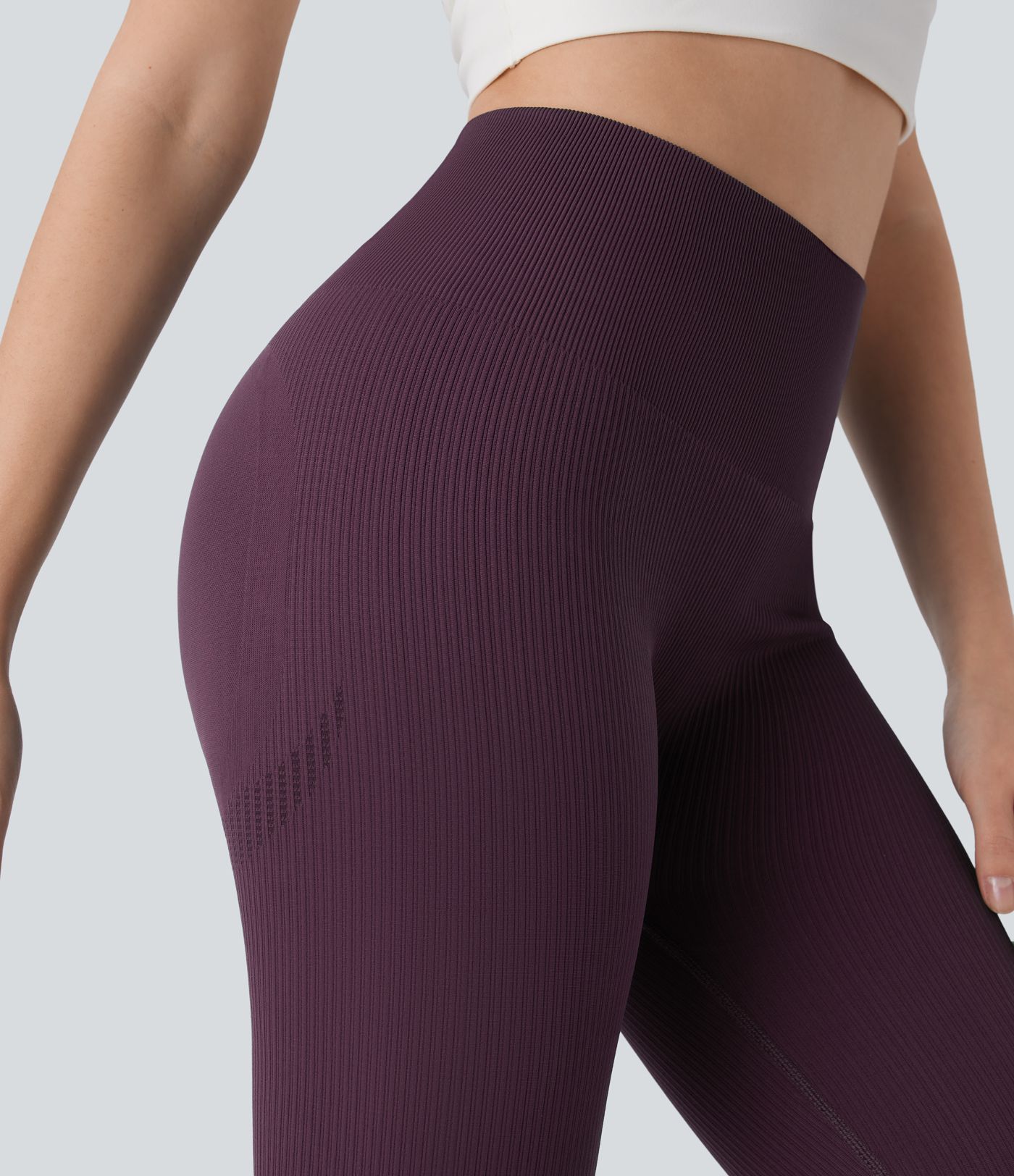 Booty-lifting 7/8 yoga leggings with a high-rise waistband, tummy control, and a seamless fit for effortless movement.