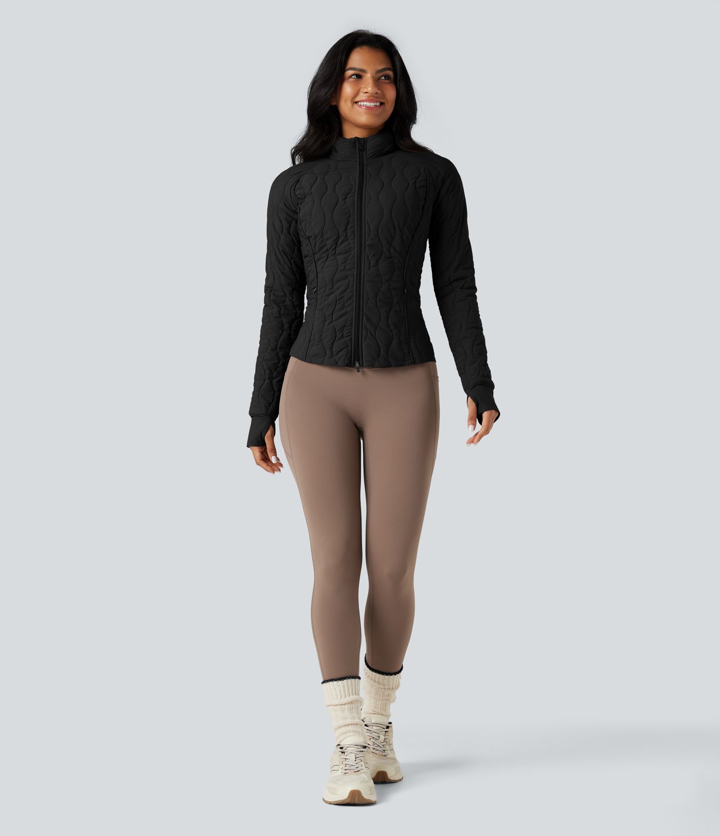 Veste d'entraînement matelassée extensible col montant avec passants pouces PuffFlex avec poches - Oreiller de voyage pliable