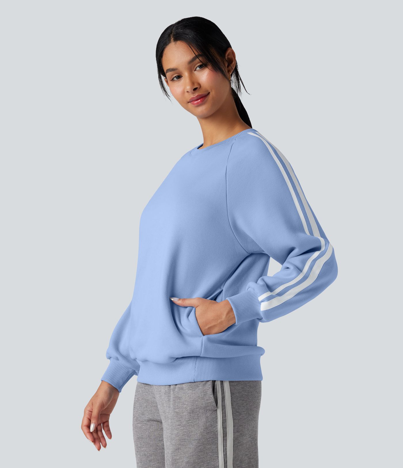 Sweat-shirt polaire color block col rond manches longues avec poches