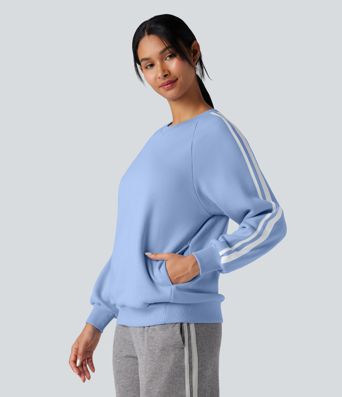 Sweat-shirt polaire color block col rond manches longues avec poches