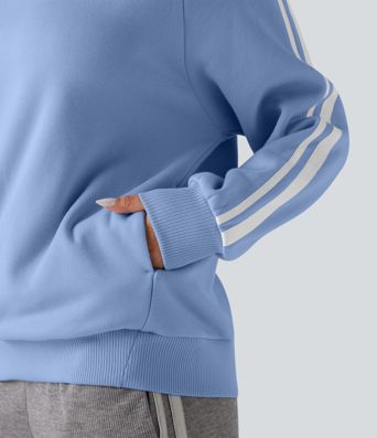 Sweat-shirt polaire color block col rond manches longues avec poches