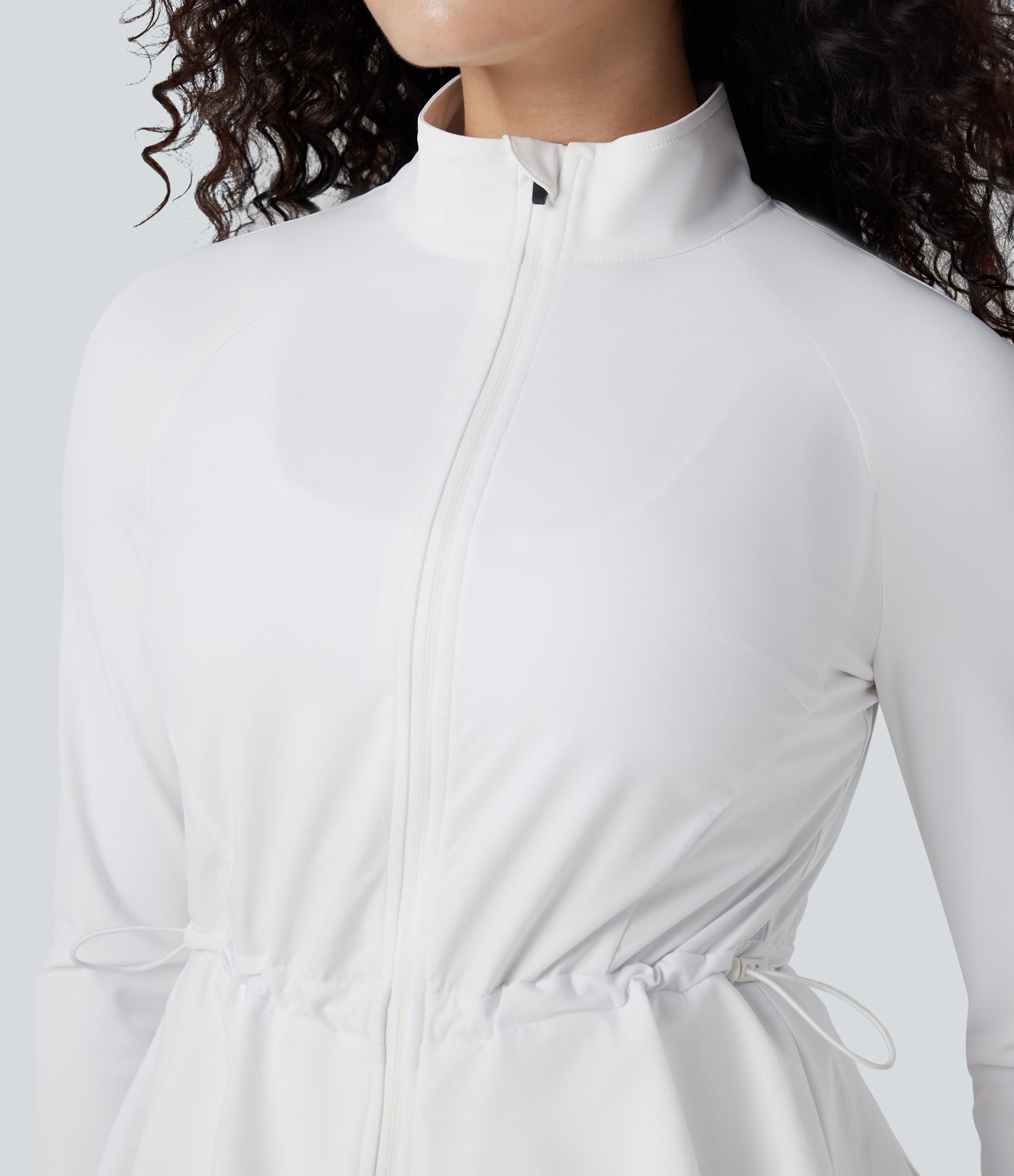 Durable Water Repellent High Neck Long Sleeve Thumb Hole Ruffle Hem Hiking Jacket with Pockets