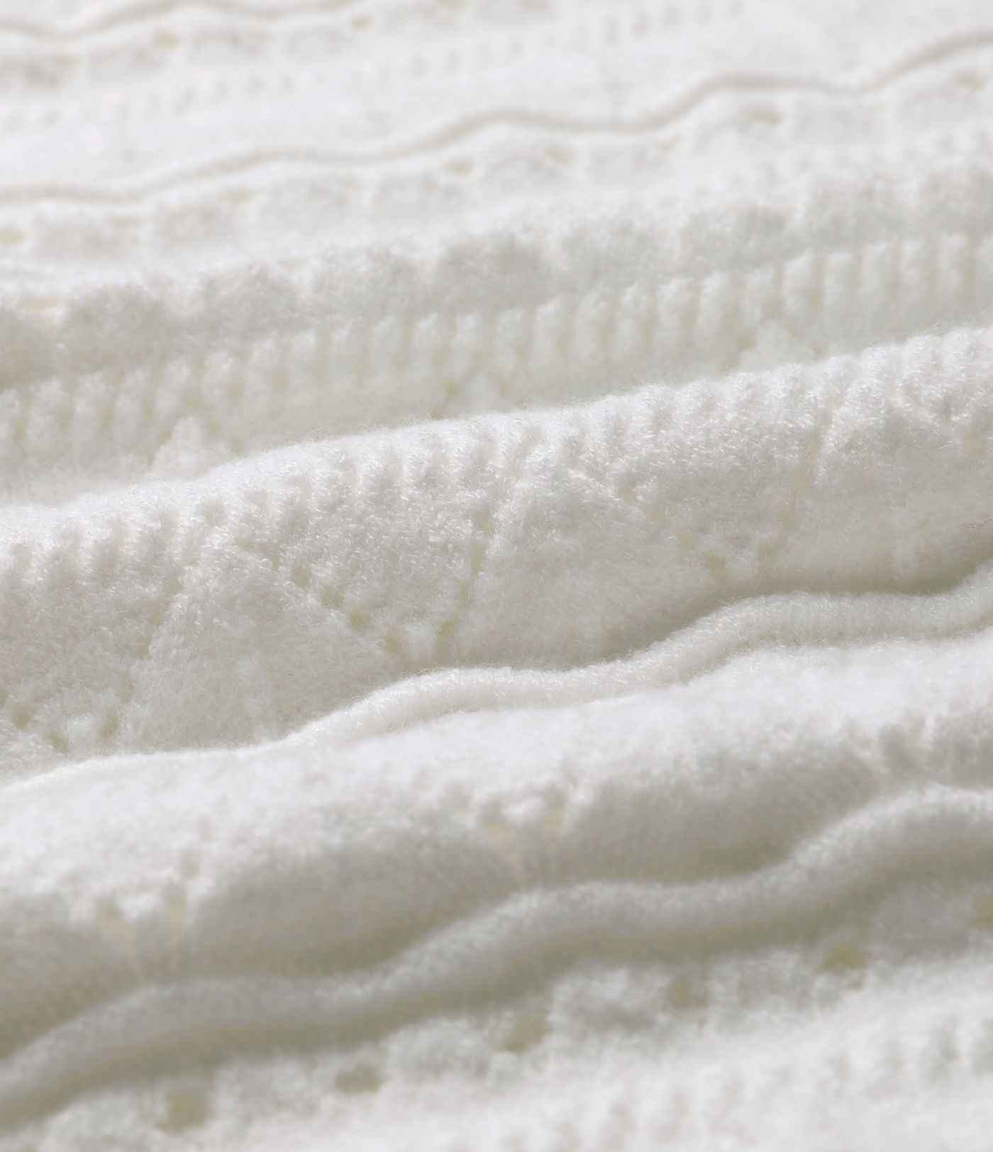 Robe pull courte col U sans manches tricot ajouré ourlet festonné