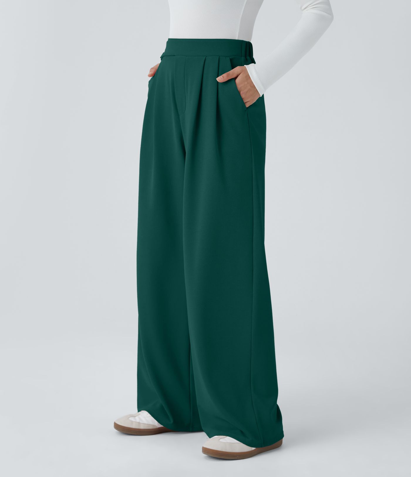 Pantalón tiro alto botón bolsillo lateral plisado pierna ancha