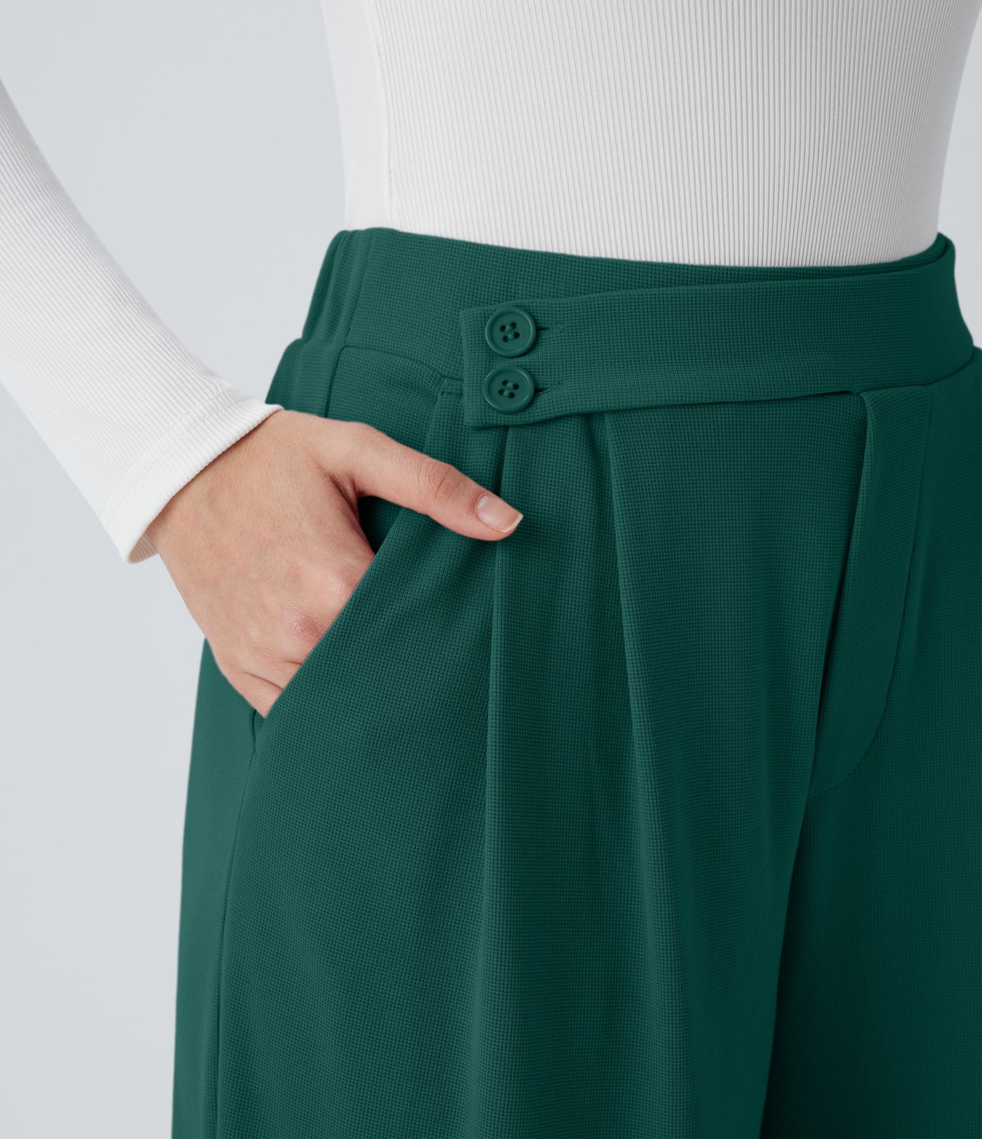 Pantalón tiro alto botón bolsillo lateral plisado pierna ancha