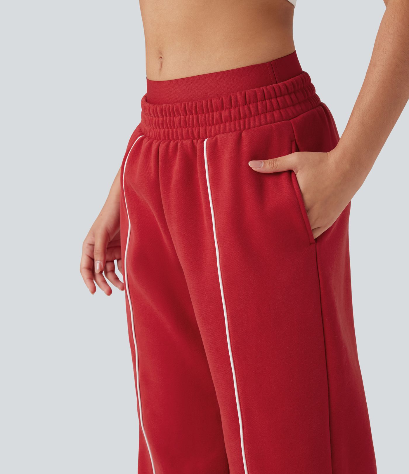 Pantalones anchos de forro polar color block con doble cinturilla, talle alto, control de abdomen, estilo casual y bolsillos.