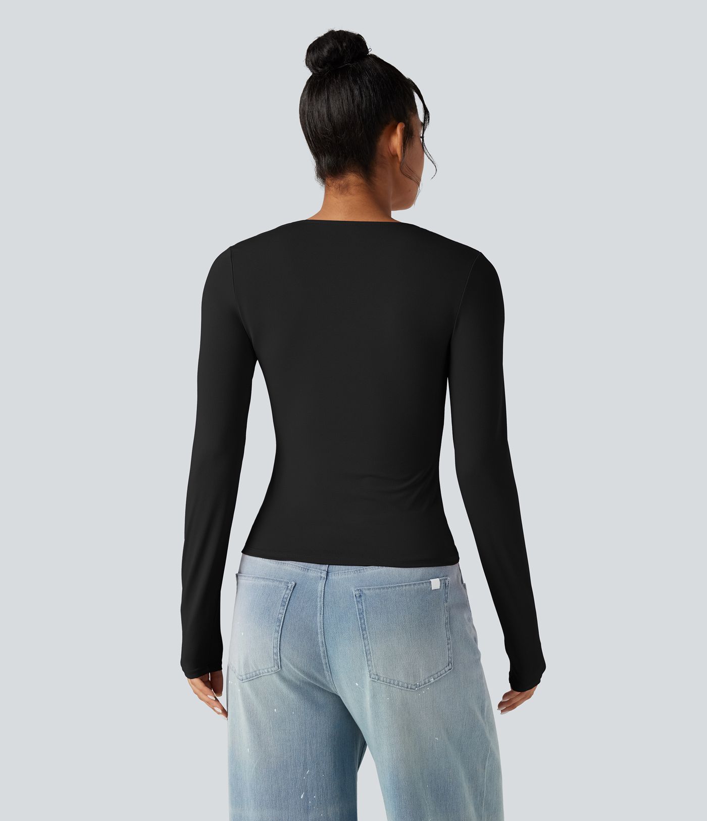 Top casual de manga larga con escote cuadrado y cordones.