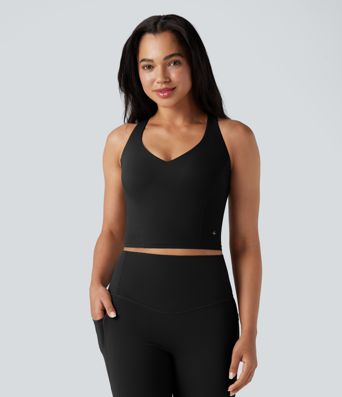 Halara UltraSculpt™ 2-i-1 yogatop med dyb V-hals, formstøbte spacer-indlæg og krydsryg