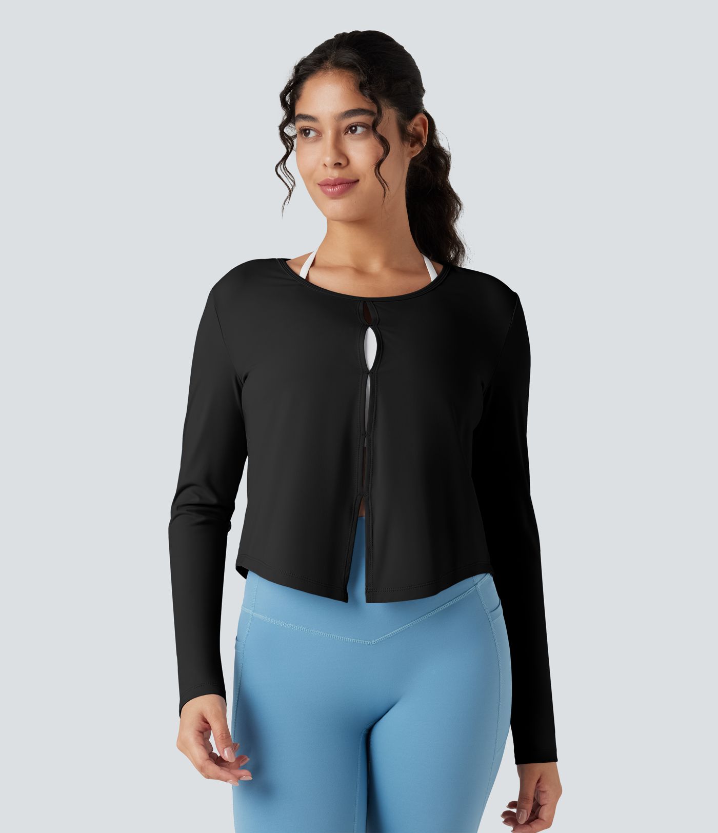 Top de sport running manches longues à découpes - Réversible devant et dos