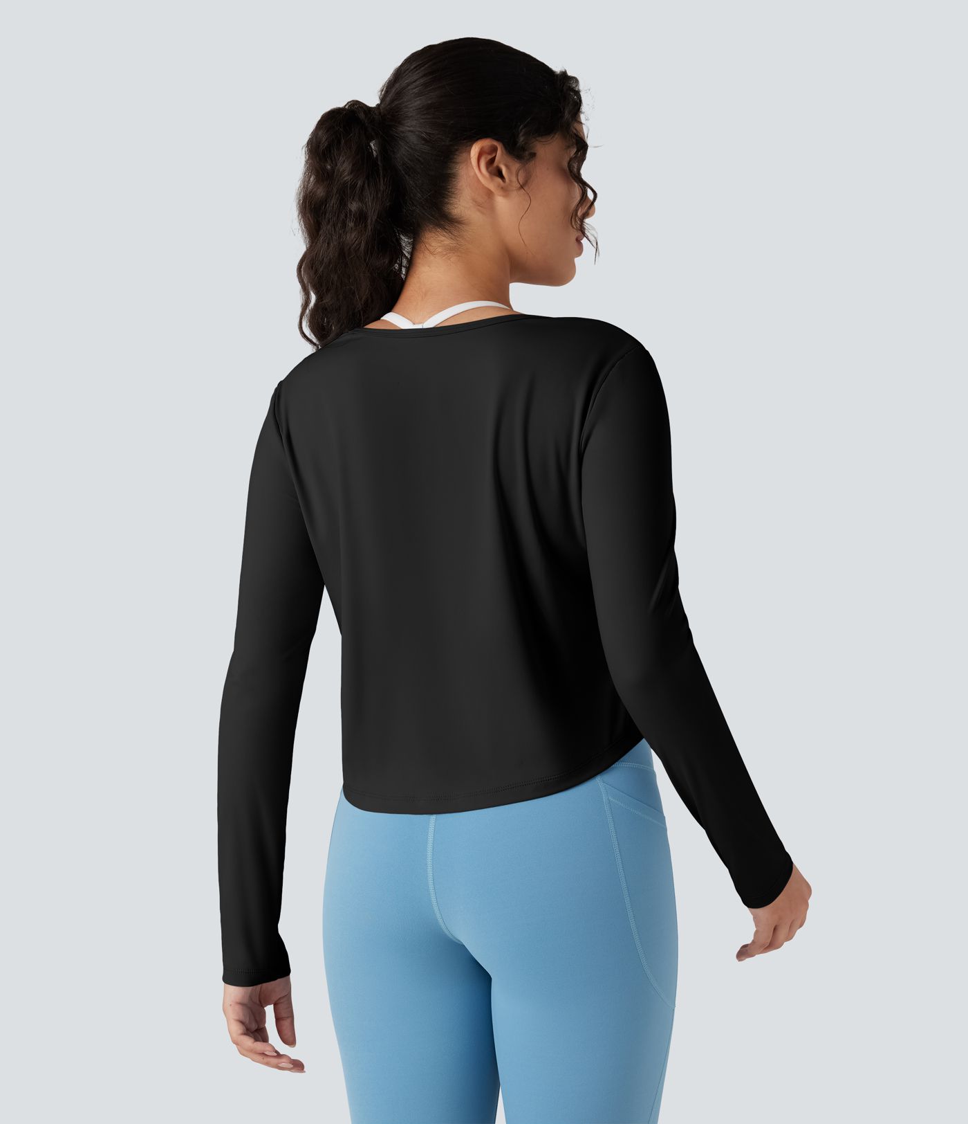 Top de sport running manches longues à découpes - Réversible devant et dos