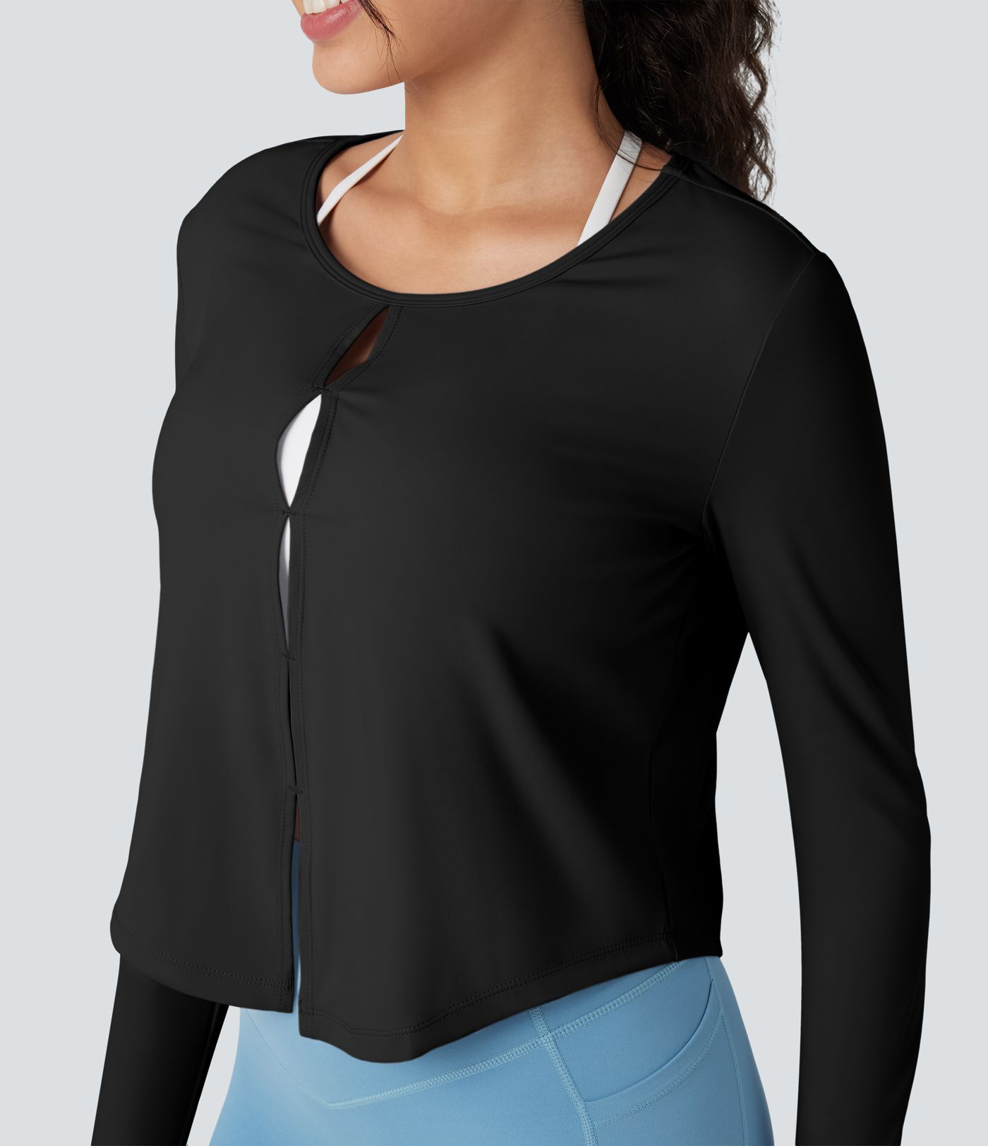 Top de sport running manches longues à découpes - Réversible devant et dos