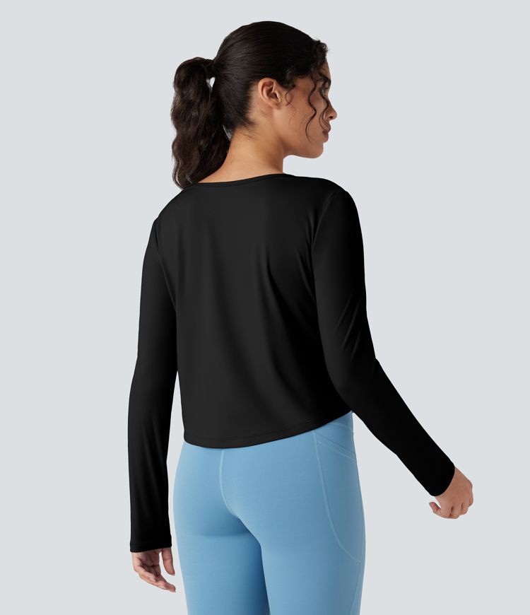 Top de sport running manches longues à découpes - Réversible devant et dos