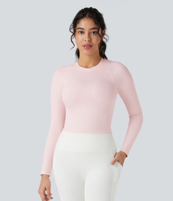 リブニット素材のラウンドネック長袖スリムフィットヨガトップ
