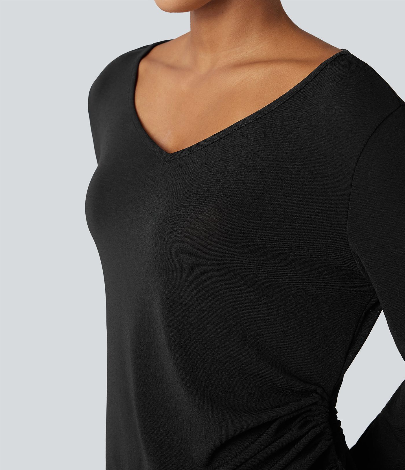 Lässiges Top mit tiefem V-Ausschnitt, langen Ärmeln und Kordelzug am Saum