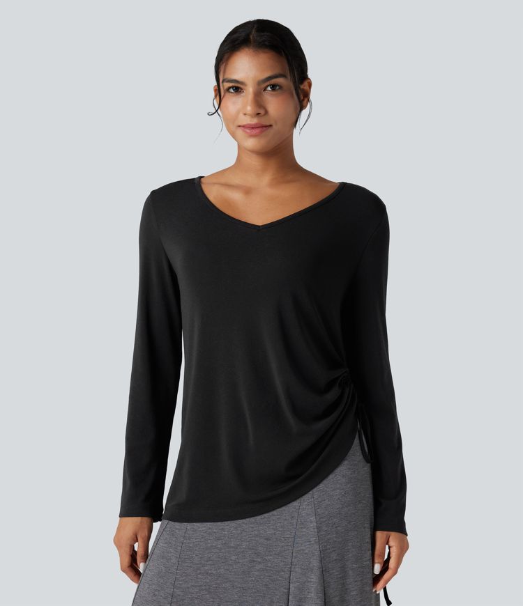 Lässiges Top mit tiefem V-Ausschnitt, langen Ärmeln und Kordelzug am Saum