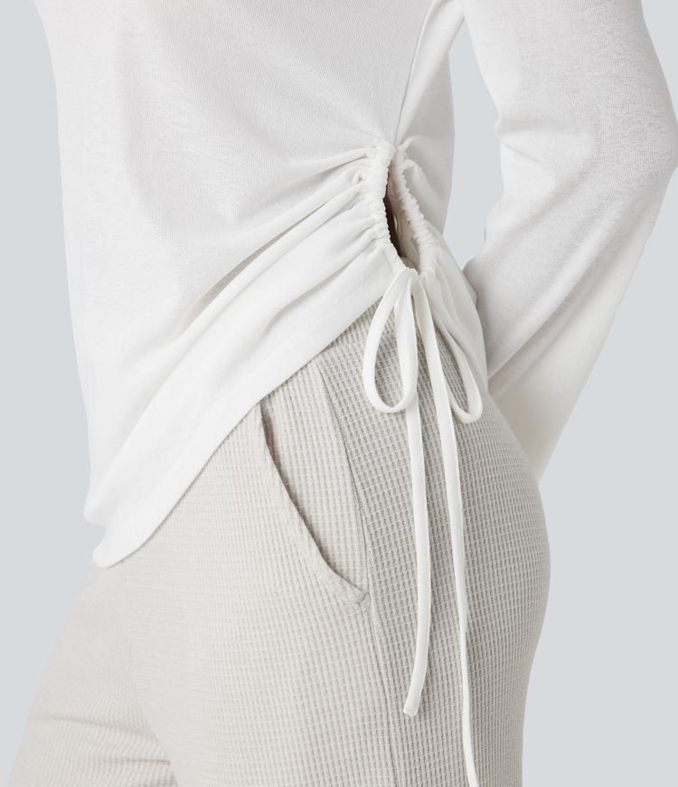 Lässiges Oberteil mit tiefem V-Ausschnitt, langen Ärmeln und Kordelzug am Saum