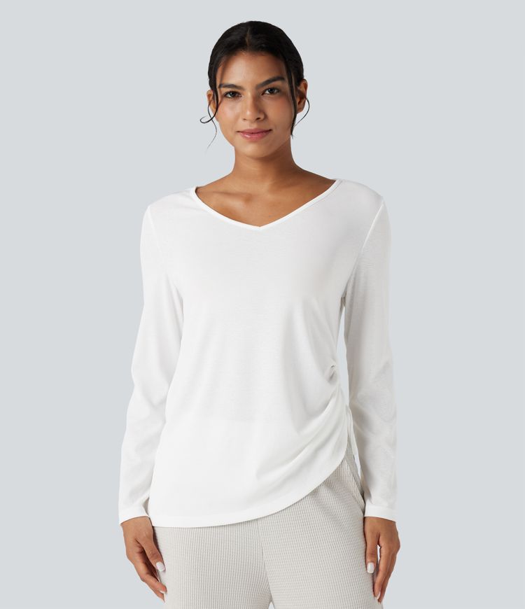 Lässiges Oberteil mit tiefem V-Ausschnitt, langen Ärmeln und Kordelzug am Saum