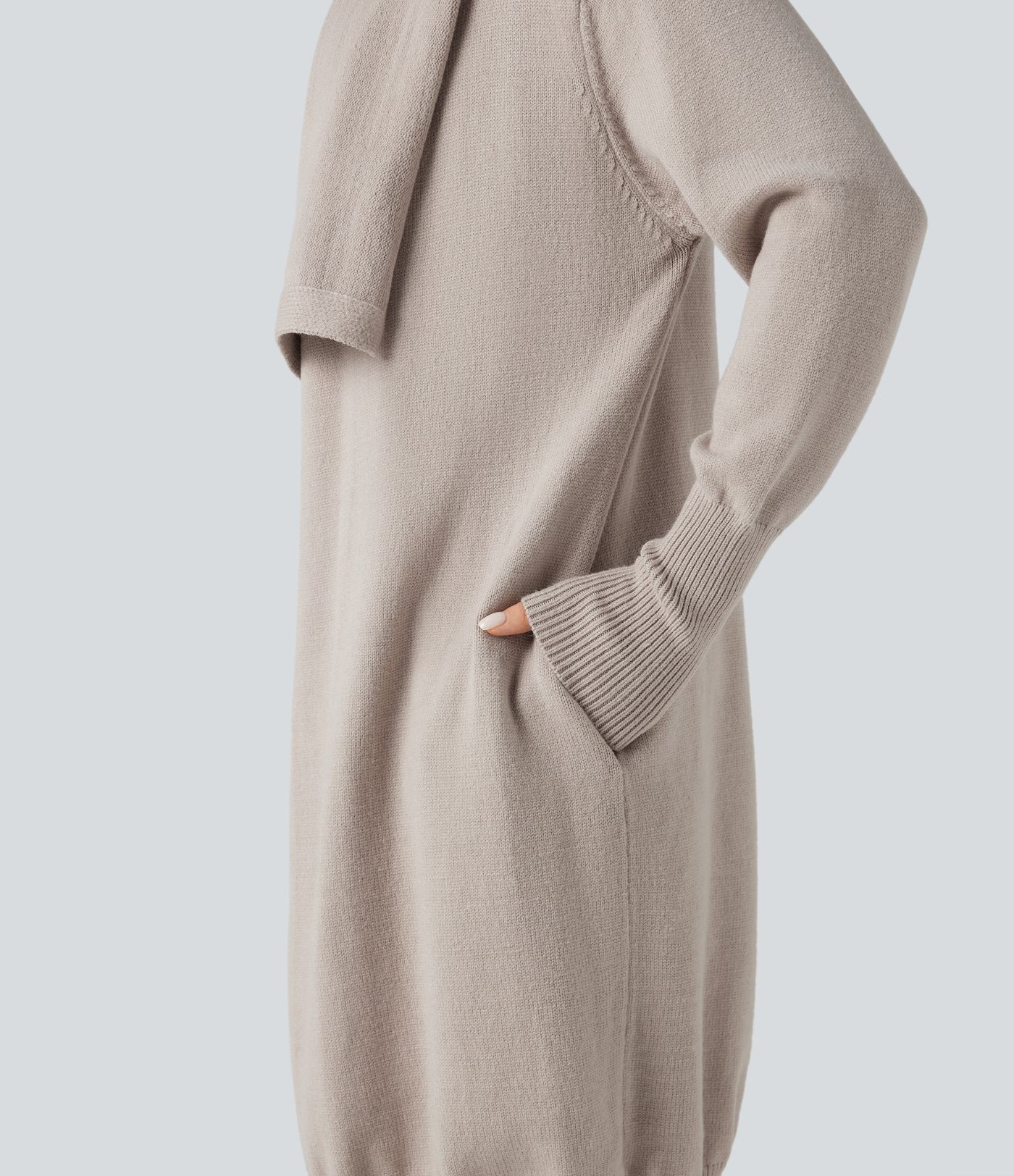 Cardigan da lavoro lungo con rever, maniche lunghe e tasche.